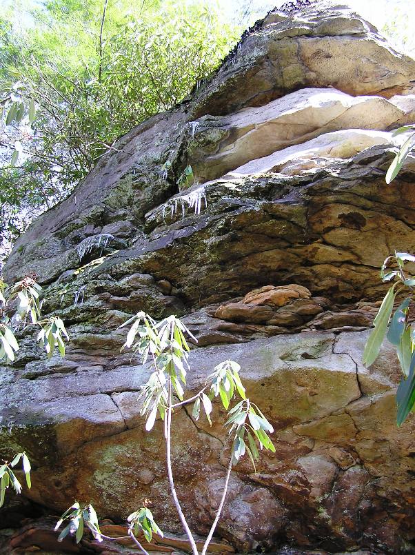 Small icicles hanging on rocks