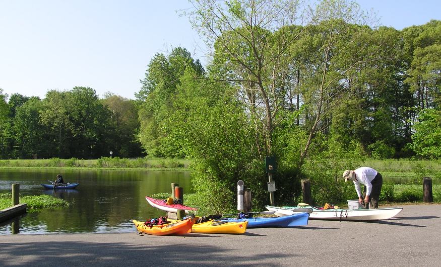 Boats ready to launch with Ralph preparing his kayak