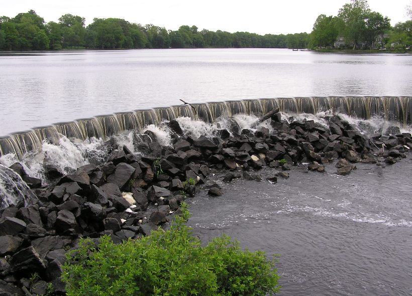 Water flowing over dam/spillway