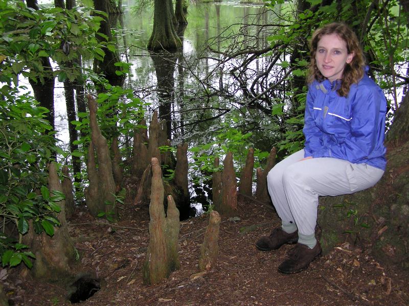 Norma seated by cypress knees