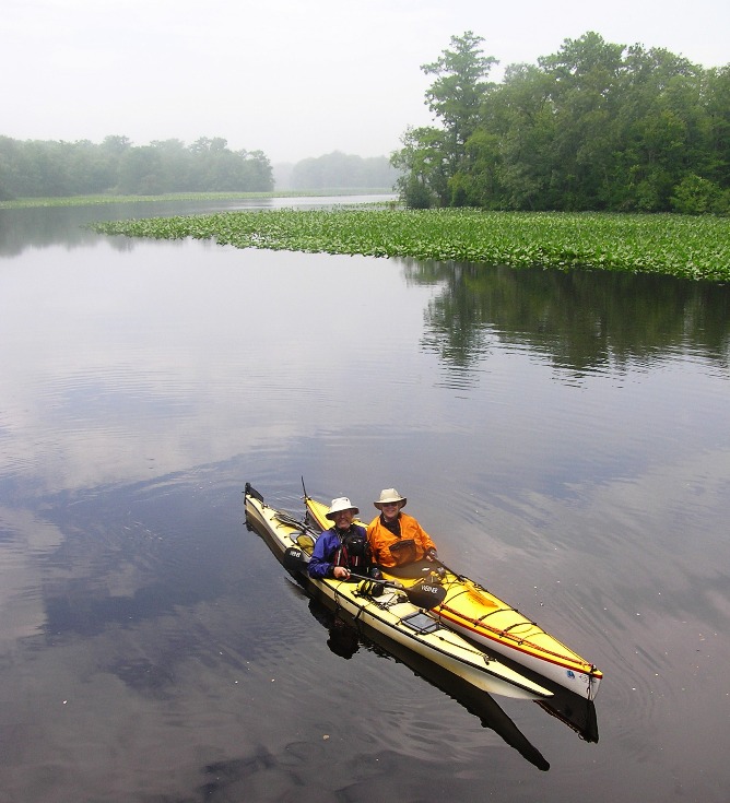 Closeup of Rich and Sue in kayaks posing