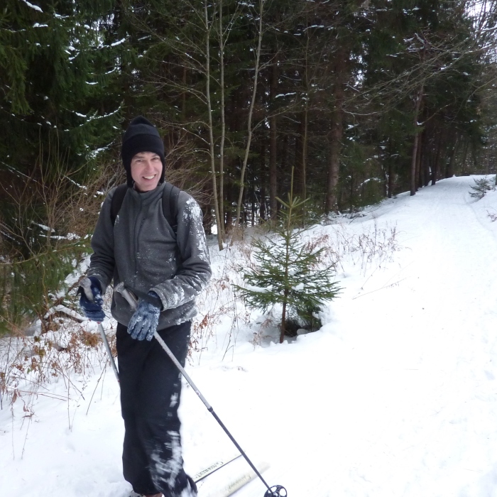 Clark with snow on his jacket and pants