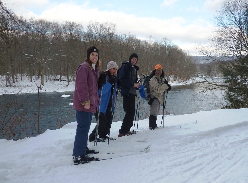 Norma, Carmen, Clark, and me on the rail trail with the river in the background