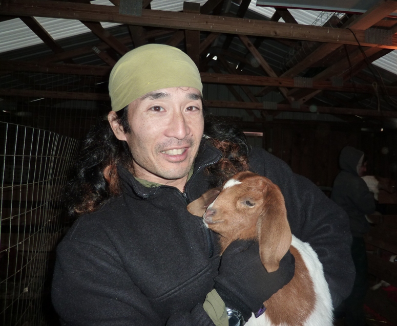 Me holding a very young goat