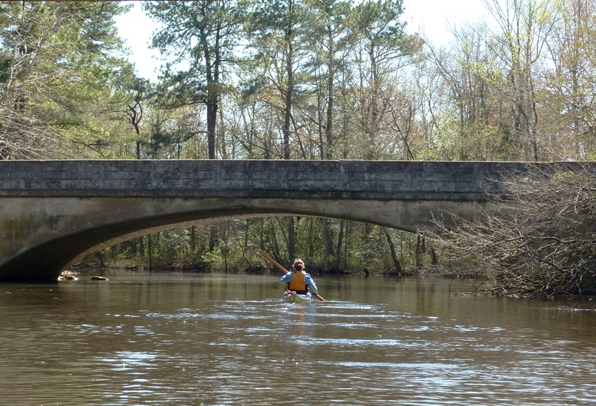 Suzanne about to paddle under the arched Furnace Road Bridge