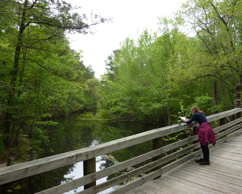 Norma on bridge over creek