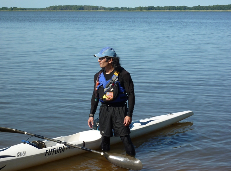 Me standing by my boat