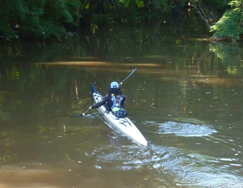 Me kayaking away from the camera