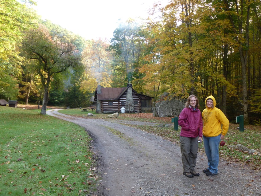 Norma and Laah at campground with cabin in background