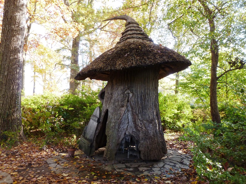 Hollow tree stump house with hat roof