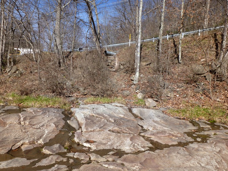 Rocky area off road to carry a boat down