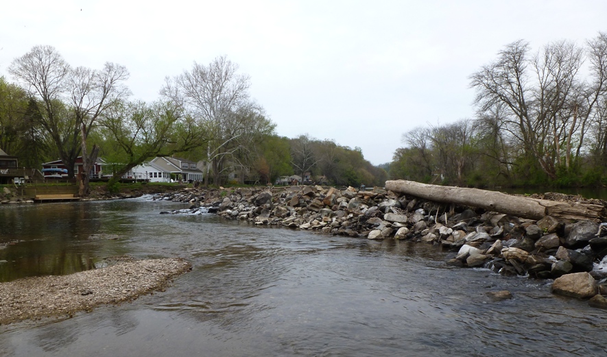 Stone dam with big log