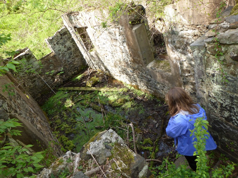 Norma exploring the stone ruins of the spring