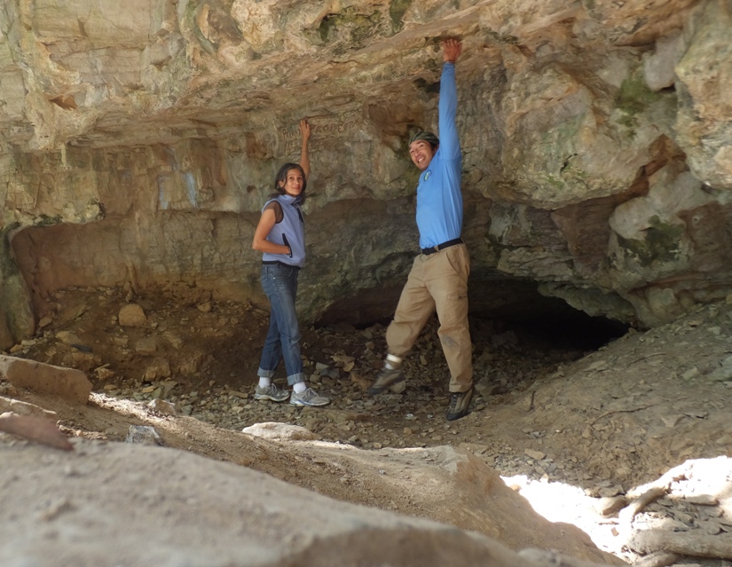 Carmen and I with me grabbing a rock attached to the ceiling which broke off