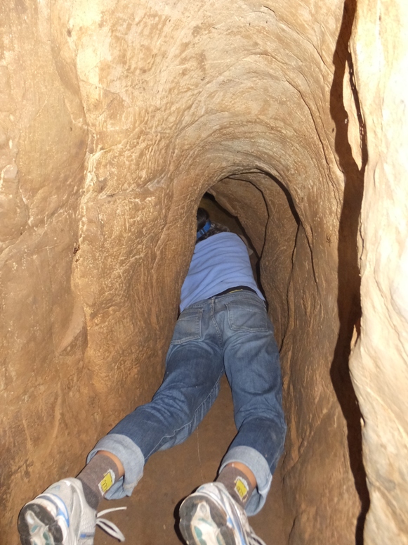 Carmen crawling deeper into the cave