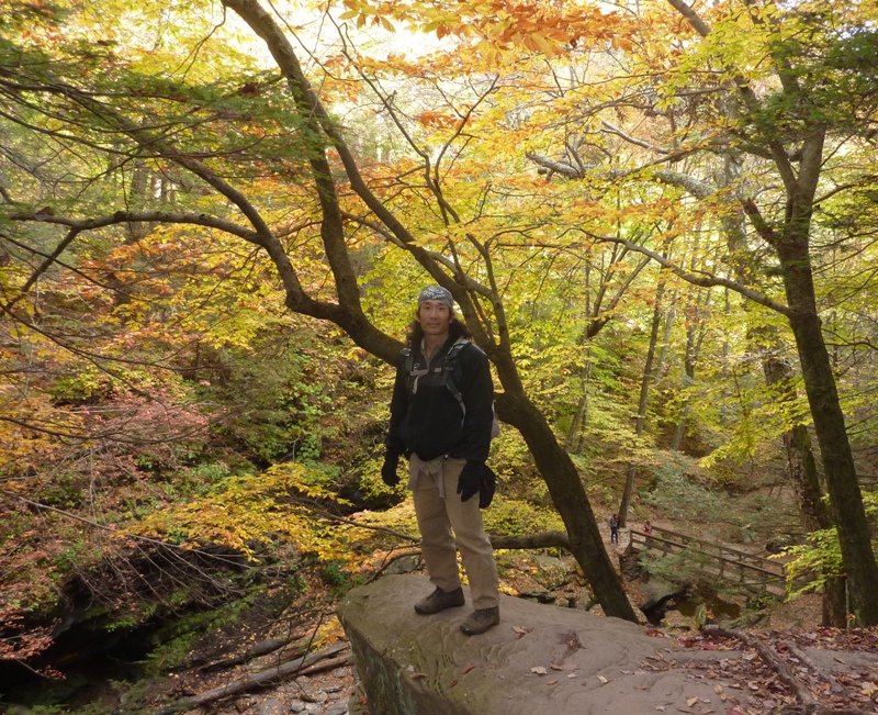 Me standing with yellow leaves all around