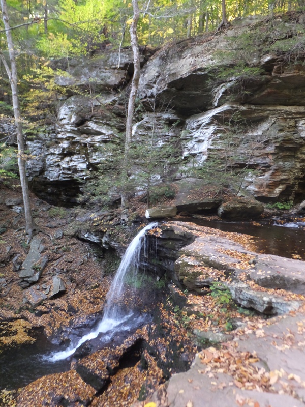 Side view of waterfall with lots of boulders