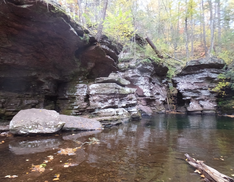 Calm water with steep rocks