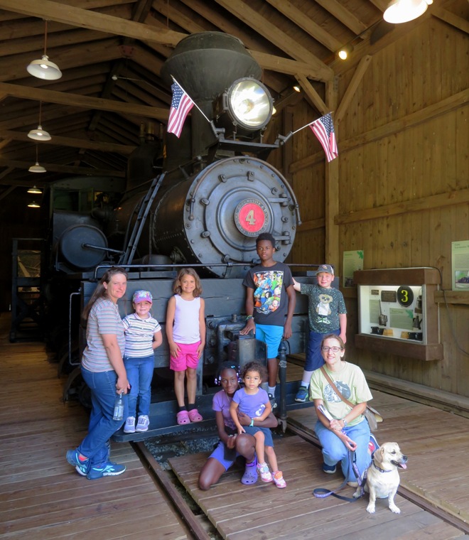 Our group gathered around the train