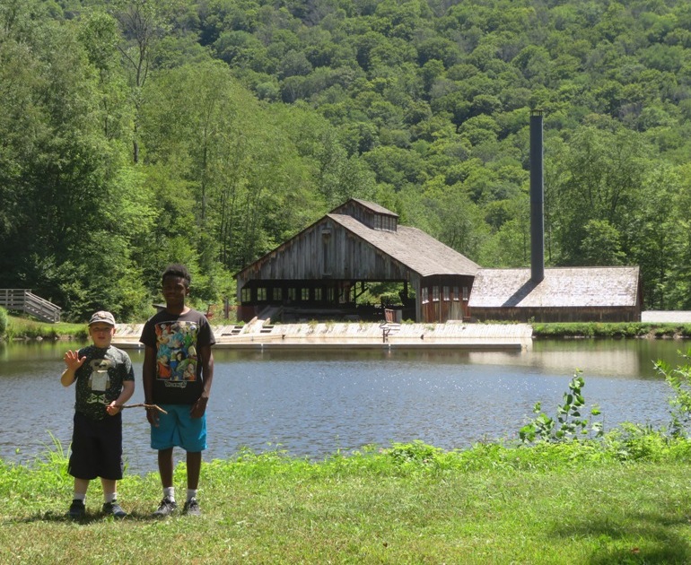 Log Pond and Saw Mill in background with newphews in the foreground