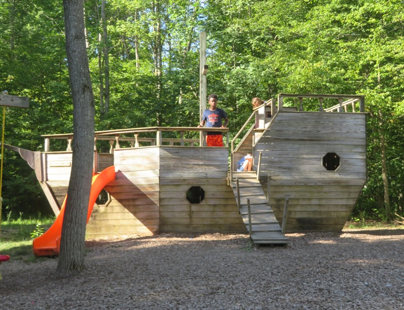 Oldest nephew on wooden ship playground