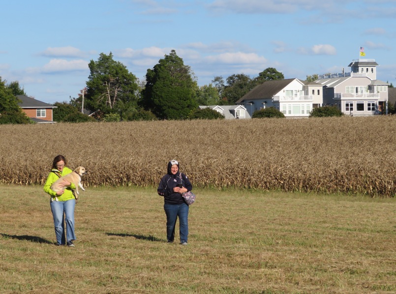 Norma carrying Daphne through field with Laah