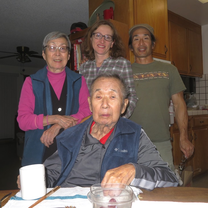 My parents, Norma, and me in the kitchen