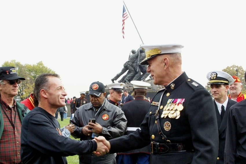 Mike shaking hands with General Conway