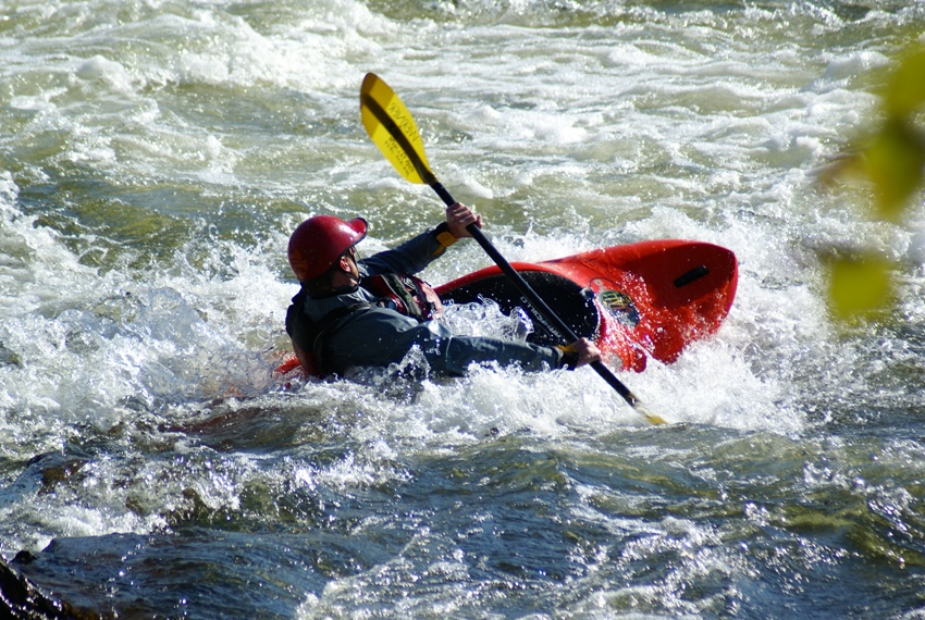 Whitewater kayaker in rapids