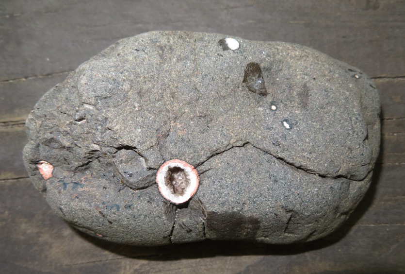 Small geode embedded in rock