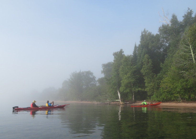 Kayaks in fog