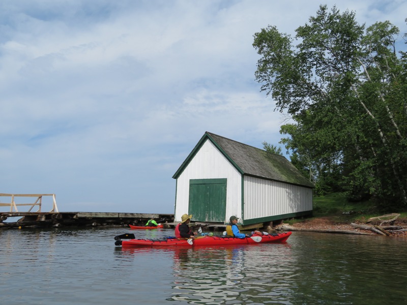 Steve and Carmen in their kayak at white boat house