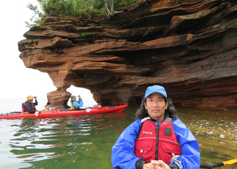 Me sitting in kayak, feeling serene, with Steve and Carmen behind