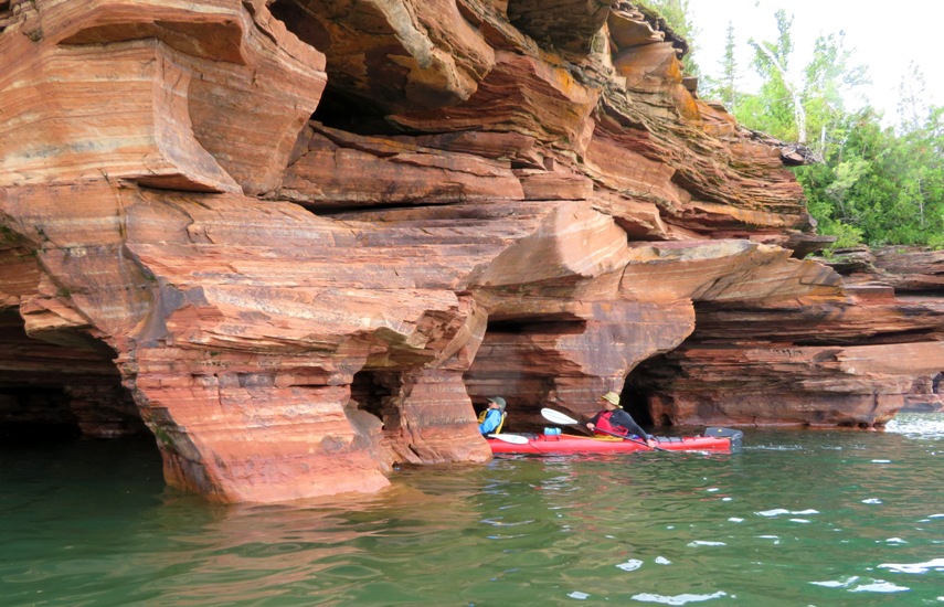 Carmen and Steve paddling into a sea cave