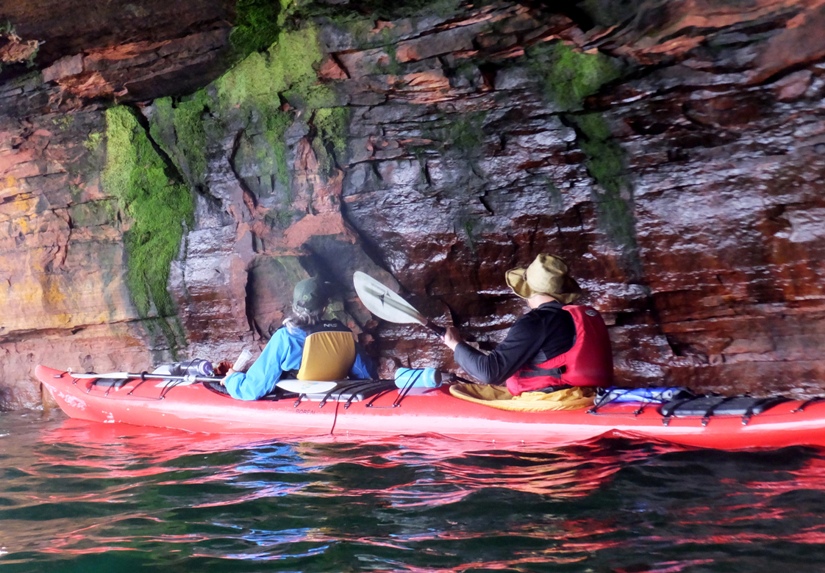 Steve and Carmen paddling past wet wall