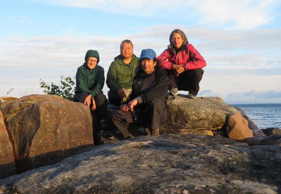 The four of us perched on a rock