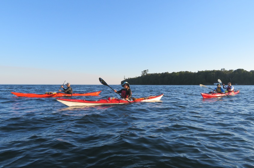 Kiah, Britta, Carmen, and Steve kayaking