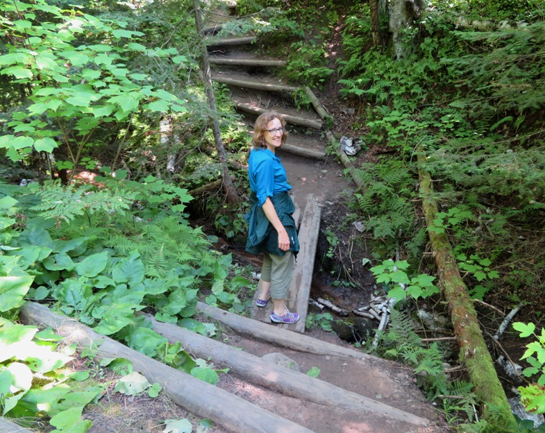 Norma at a small bridge over a wet area