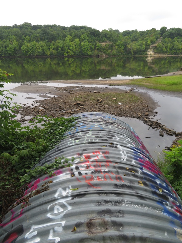 Graffiti-covered drainage pipe