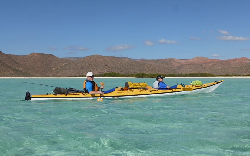 Tandem kayak on clear blue water