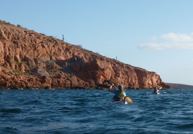 Back view of Kim kayaking