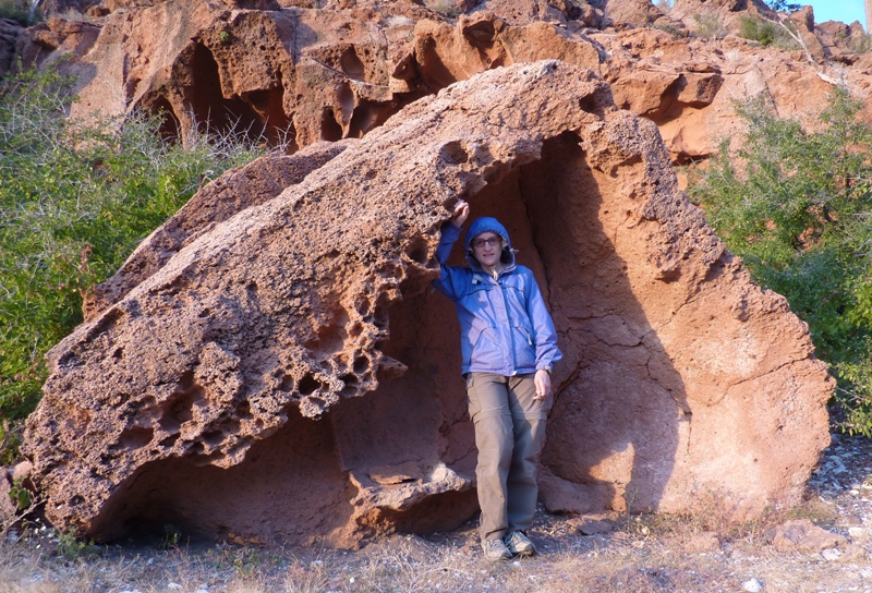 Norma in a hollowed-out section of volcanic rock