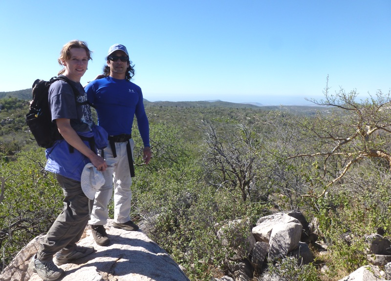 Norma and I on a big rock with vegetation below