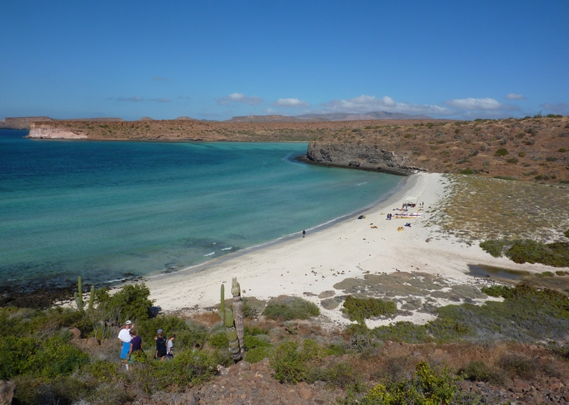 Looking down on the beach and clear water