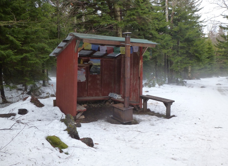 Open-faced warming hut