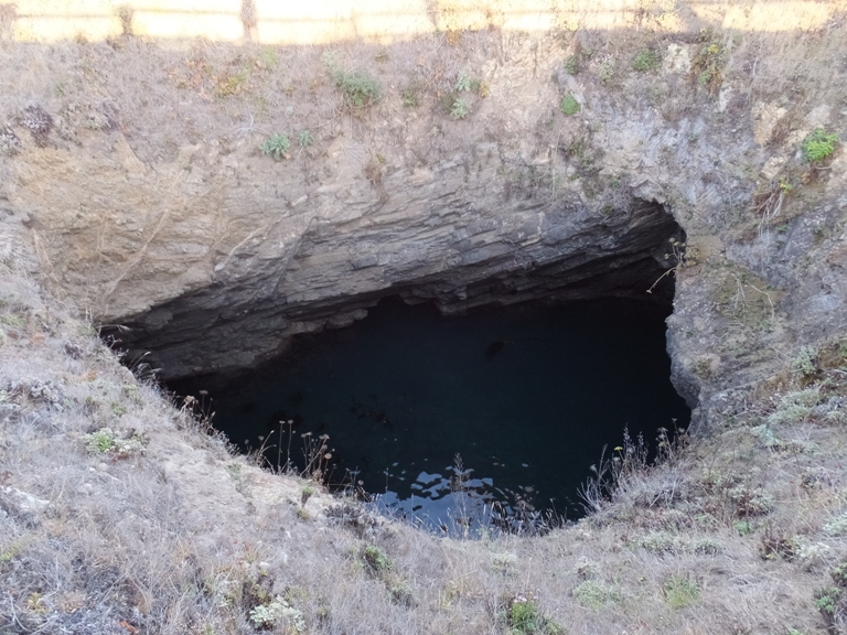 Looking down into the cave from above