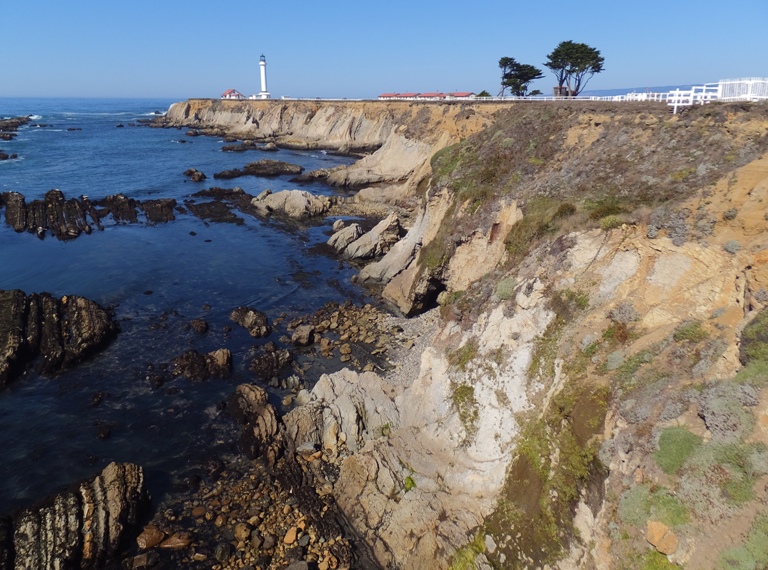 Lighthouse on rocky peninsula