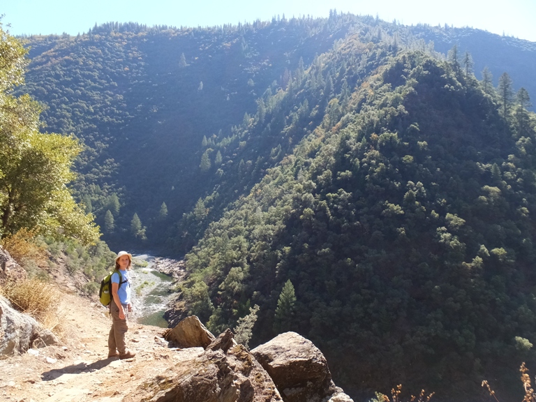 Norma on the trail with the river below