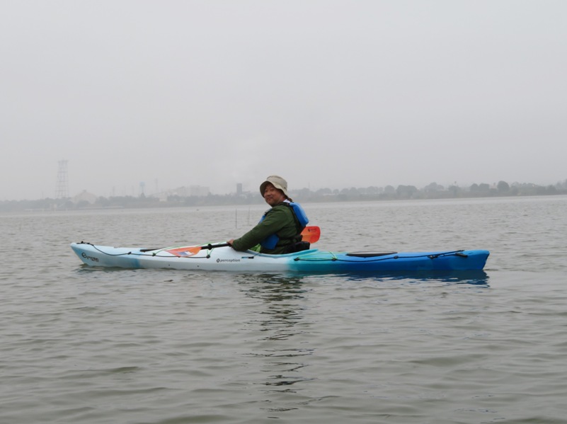 Steve in kayak on cloudy day