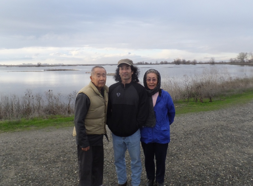 My parents and I in front of the North Fork of Logan Creek